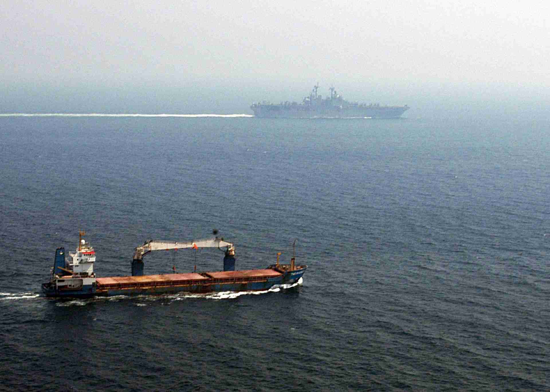 A merchant ship transiting the Strait of Hormuz