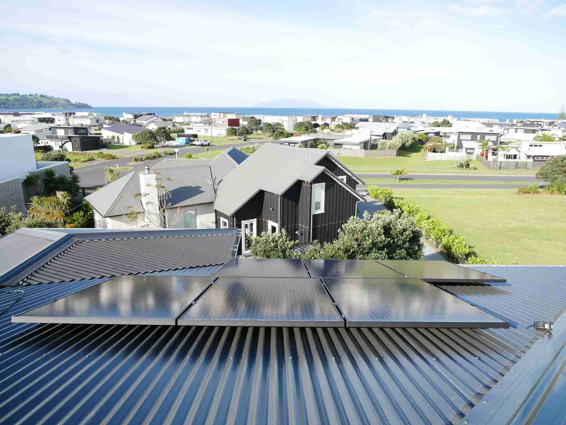 Rooftop solar panels on a house in Auckland, New Zealand