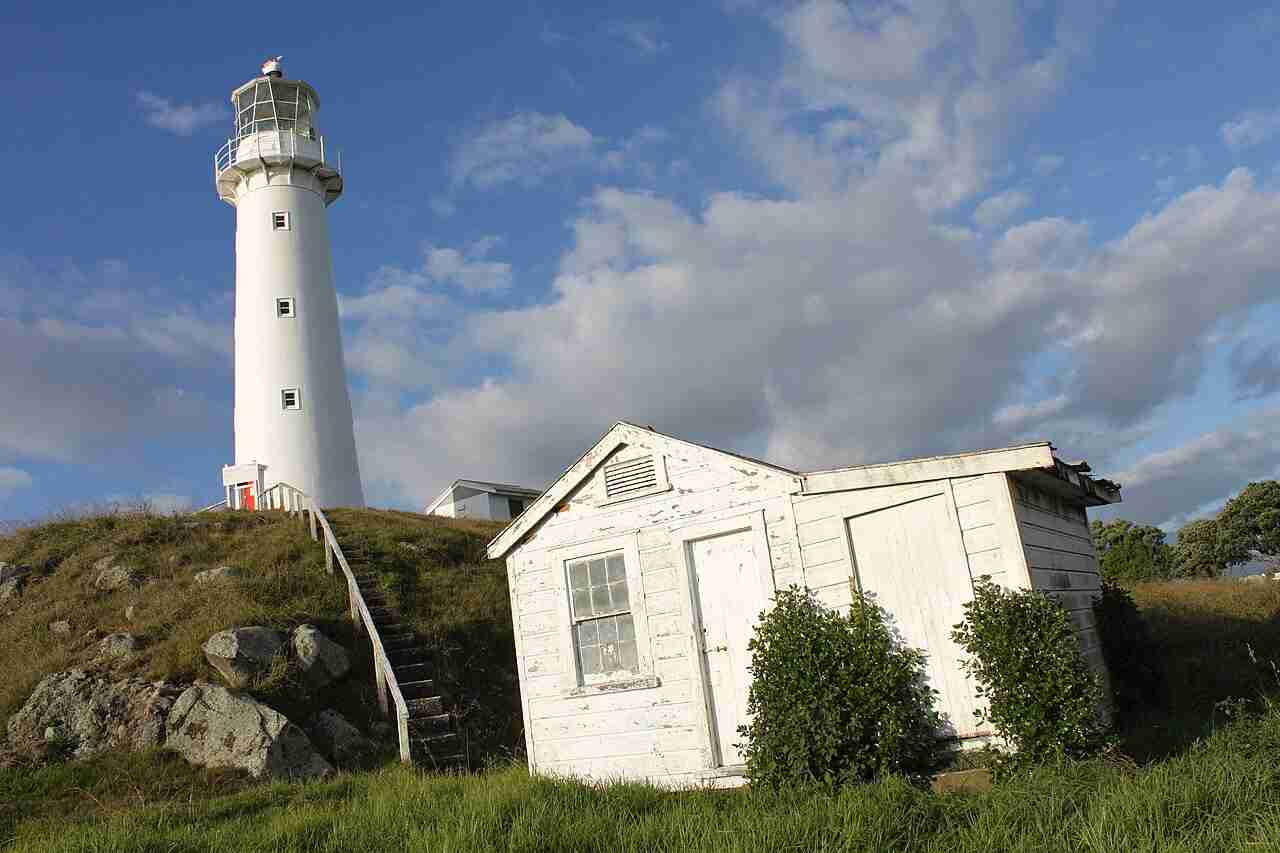 Cape Egmont Lighthouse with Mount Taranaki behind it