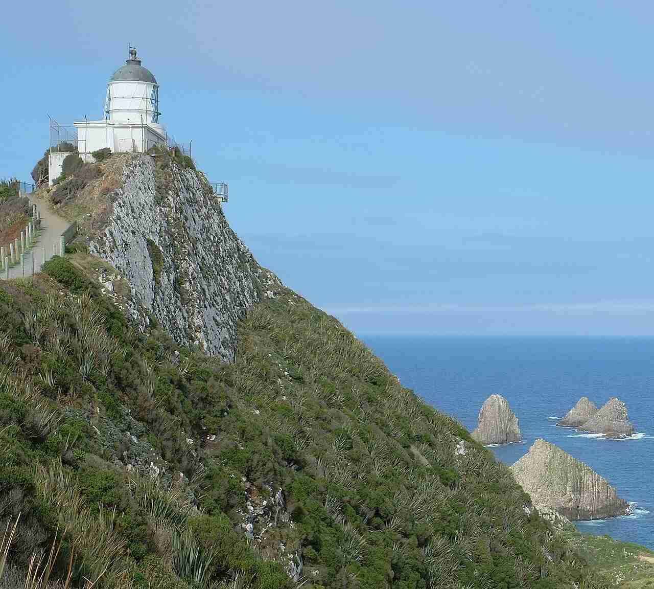 Nugget Point Lighthouse above the rocky islets known as the Nuggets in the Catlins