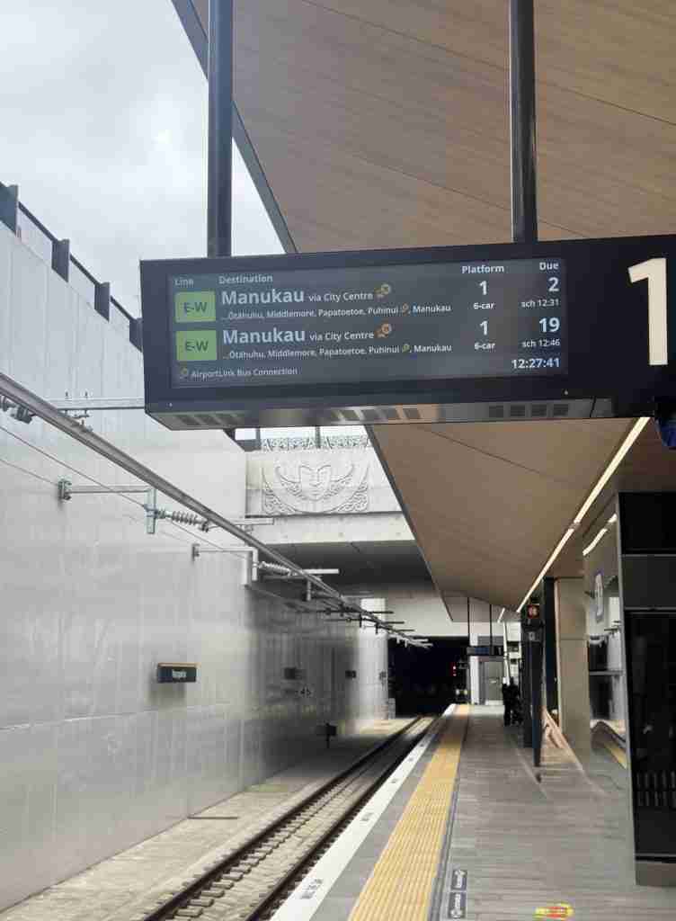 Departure board on platform 1 at Maungawhau Station showing Manukau via City Centre services due in 2 and 19 minutes